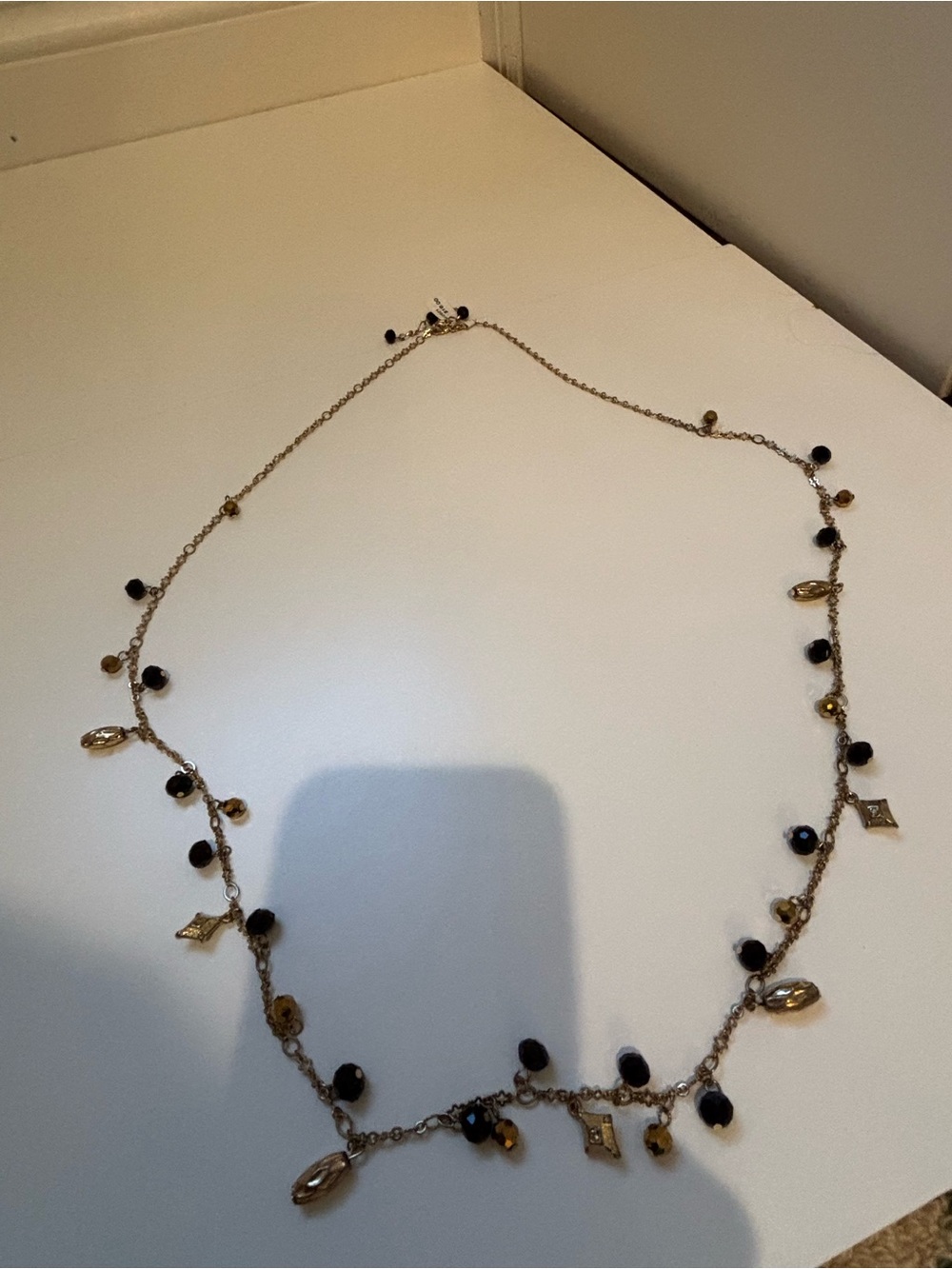 Gold-Tone and black holiday long necklace Jewelry